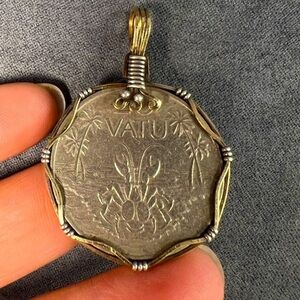 Vintage Vatu crab coin pendant wrapped in 925 sterling silver.
